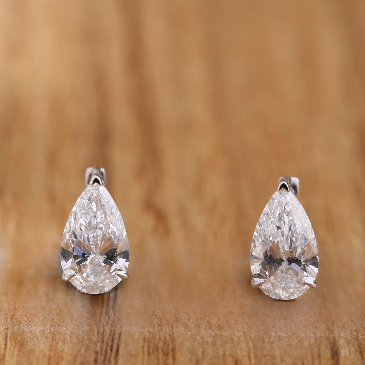 Pear Cut Diamond Huggie Drop Earrings.