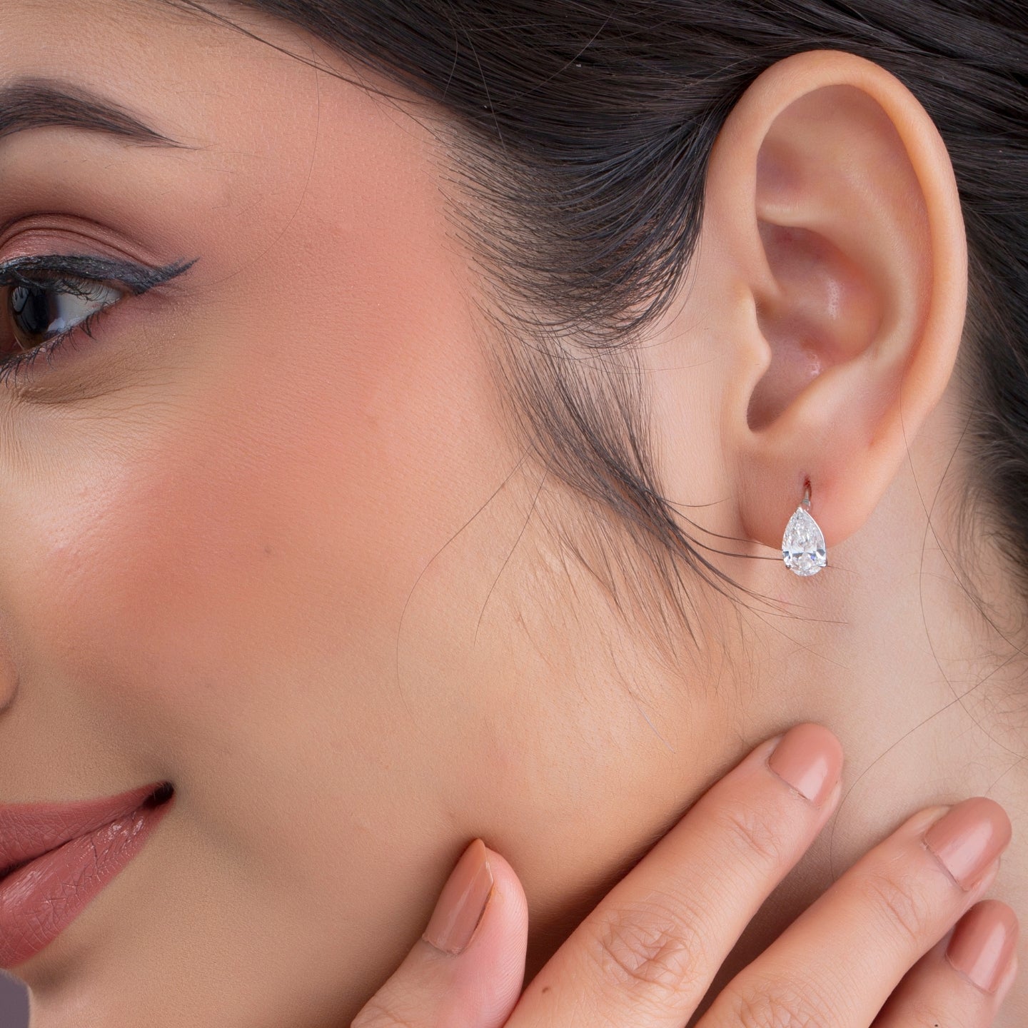 Pear Cut Diamond Huggie Drop Earrings.