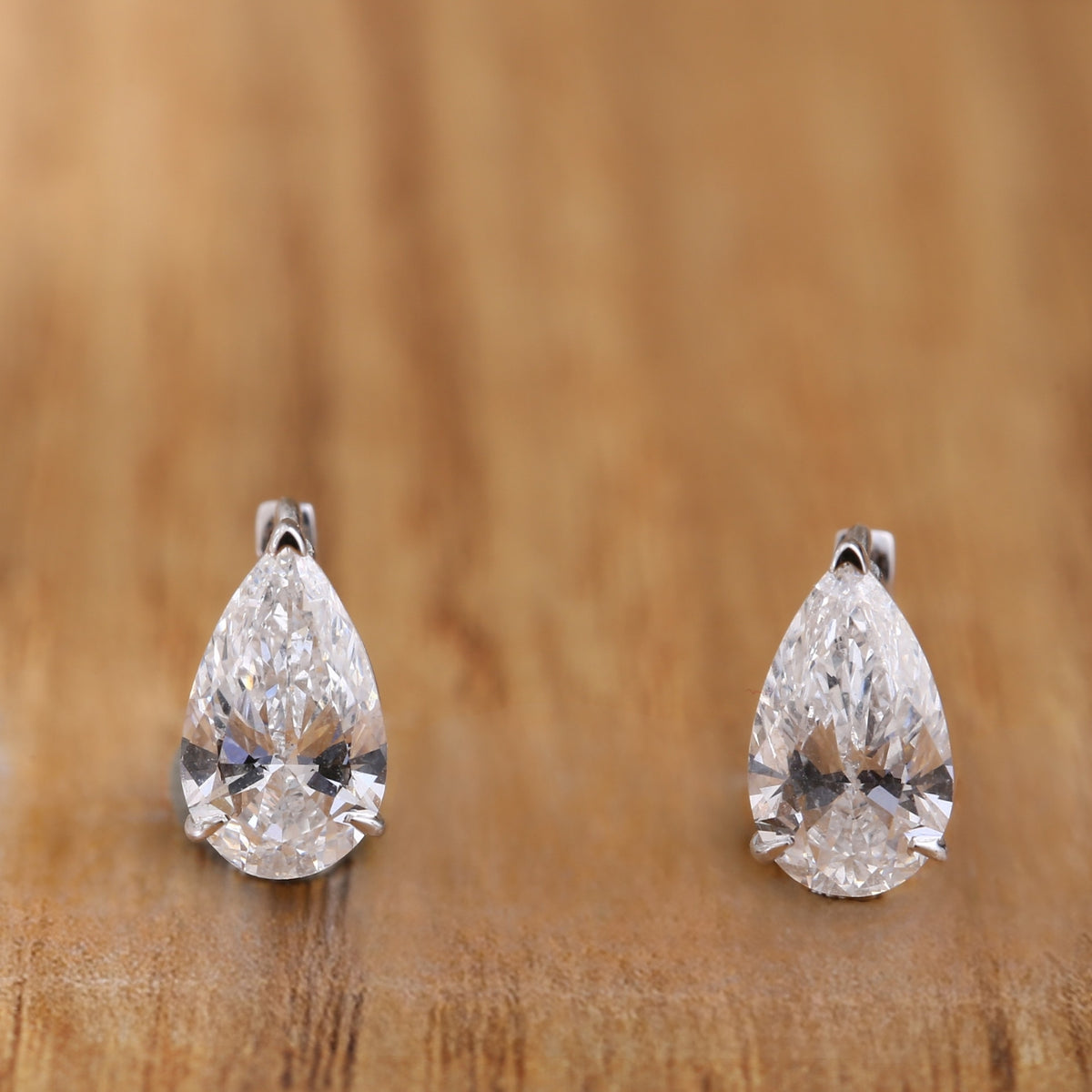 Pear Cut Diamond Huggie Drop Earrings.