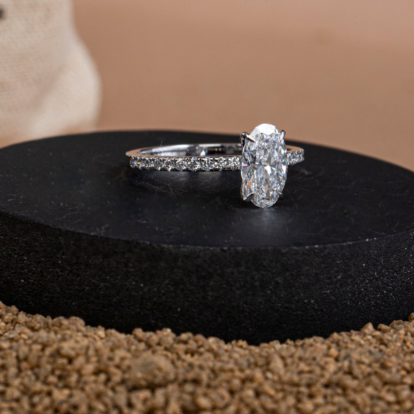 Claw Prongs Oval Pavé Diamond Ring.