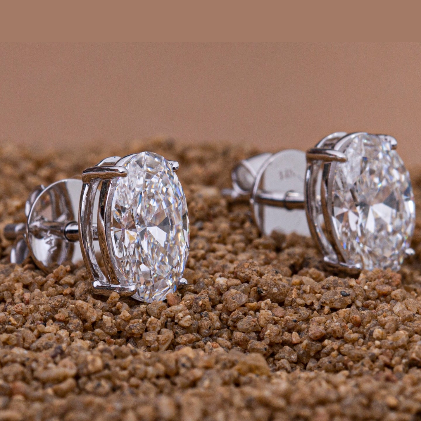 Oval Cut Diamond Earrings.