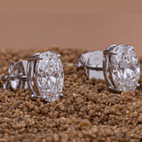 Oval Cut Diamond Earrings.