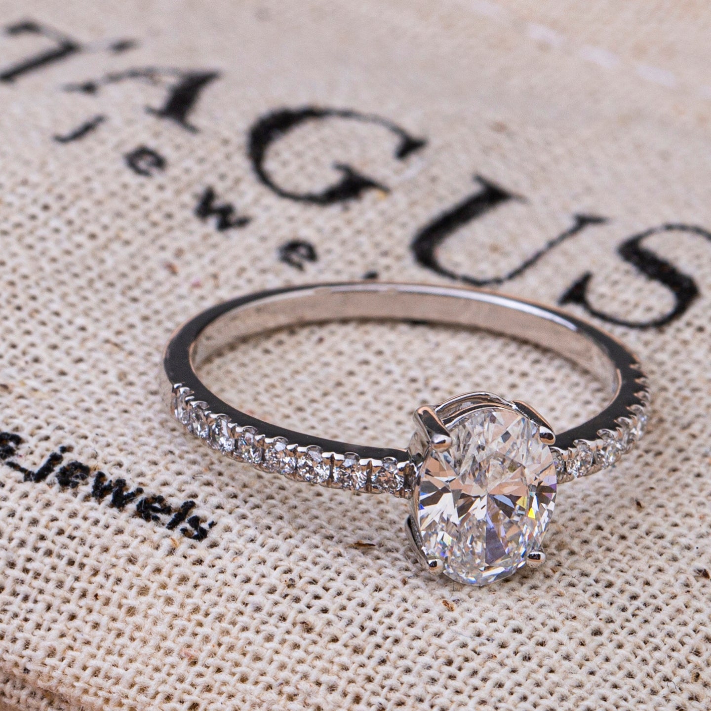 Shared Prong Pavé Band Oval Ring.