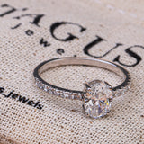 Shared Prong Pavé Band Oval Ring.