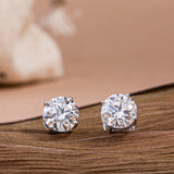 Round Cut Diamond Earrings.