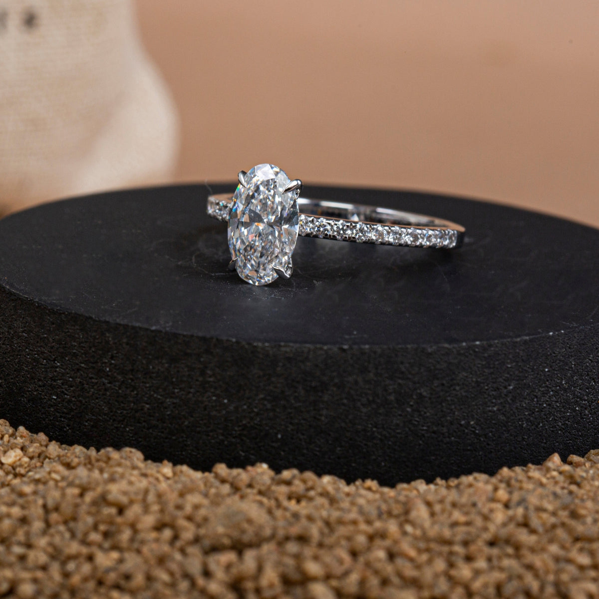 Claw Prongs Oval Pavé Diamond Ring.