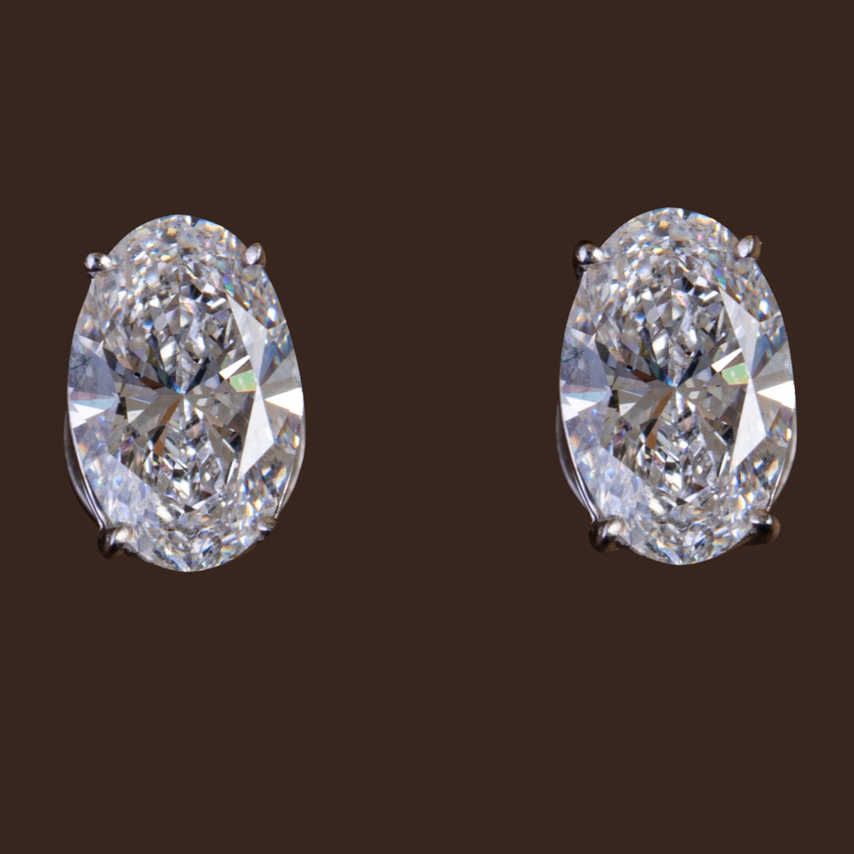 Oval Cut Diamond Earrings.