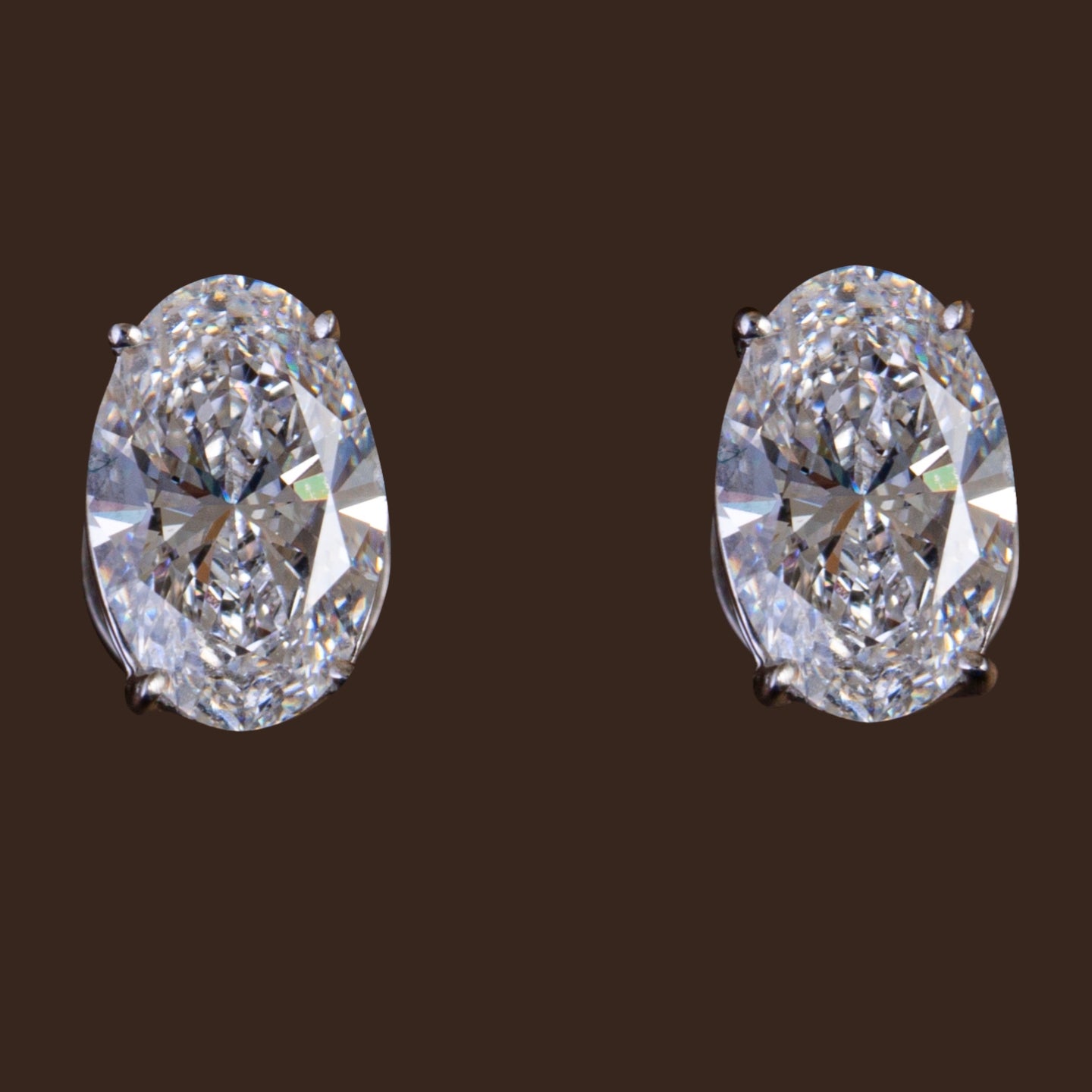 Oval Cut Diamond Earrings.