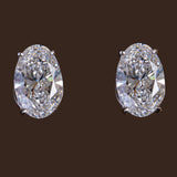 Oval Cut Diamond Earrings.