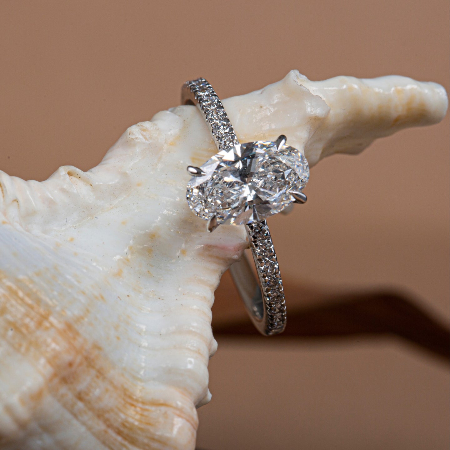 Claw Prongs Oval Pavé Diamond Ring.