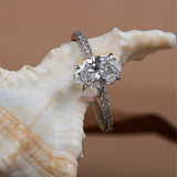 Claw Prongs Oval Pavé Diamond Ring.