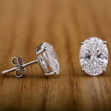 Oval Cut Diamond Earrings.