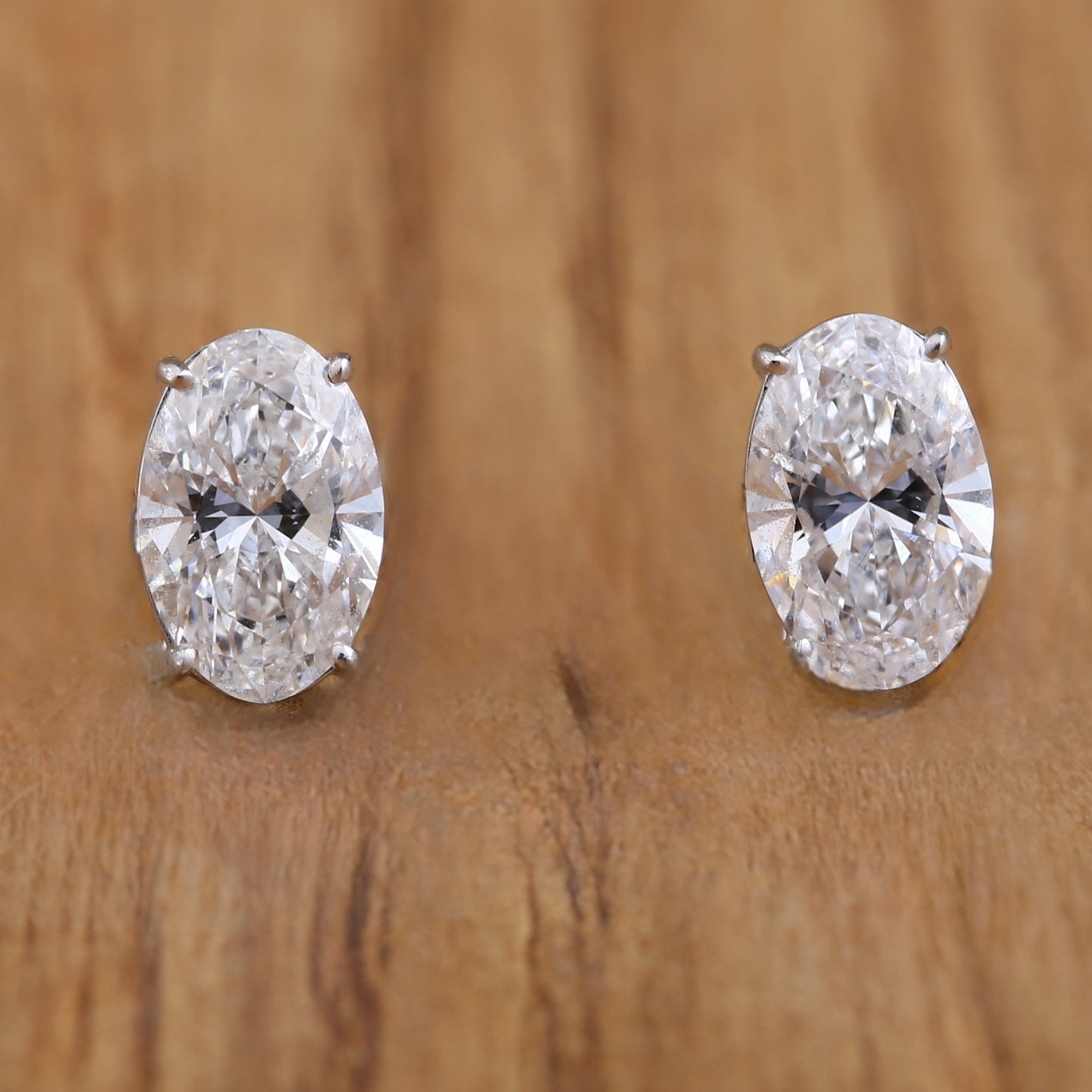 Oval Cut Diamond Earrings.