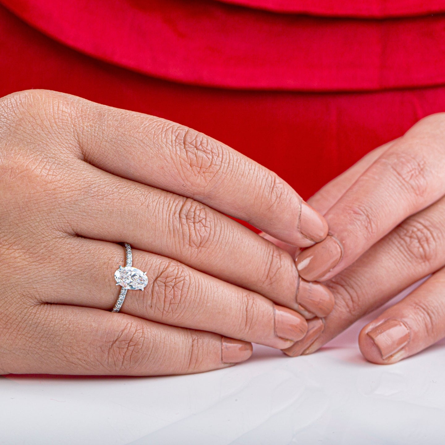 Claw Prongs Oval Pavé Diamond Ring.